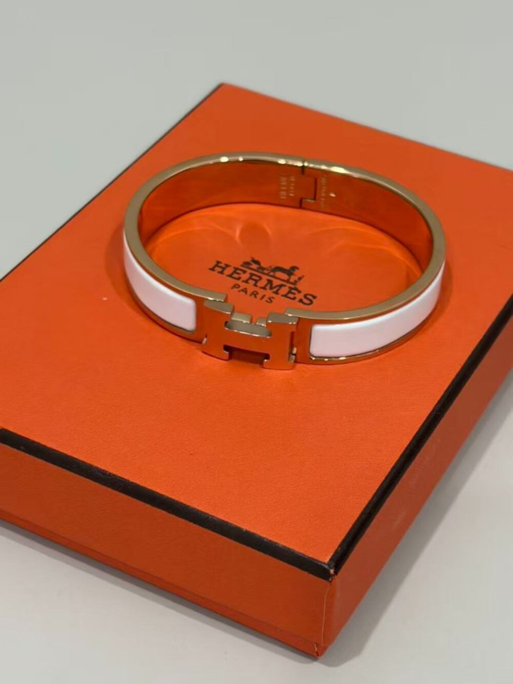 Hermès Clic H White Enamel Rose Gold Bangle Bracelet
